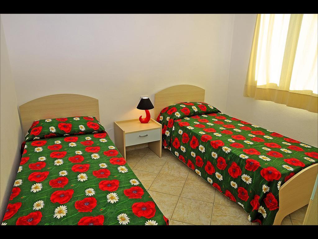 Residenze Mare e Pineta Aparthotel Budoni Camera foto